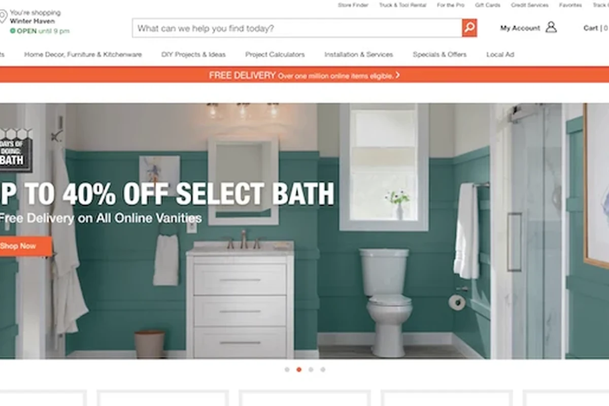 Smart-home shopper browsing the Home Depot website on a laptop in a modern living room