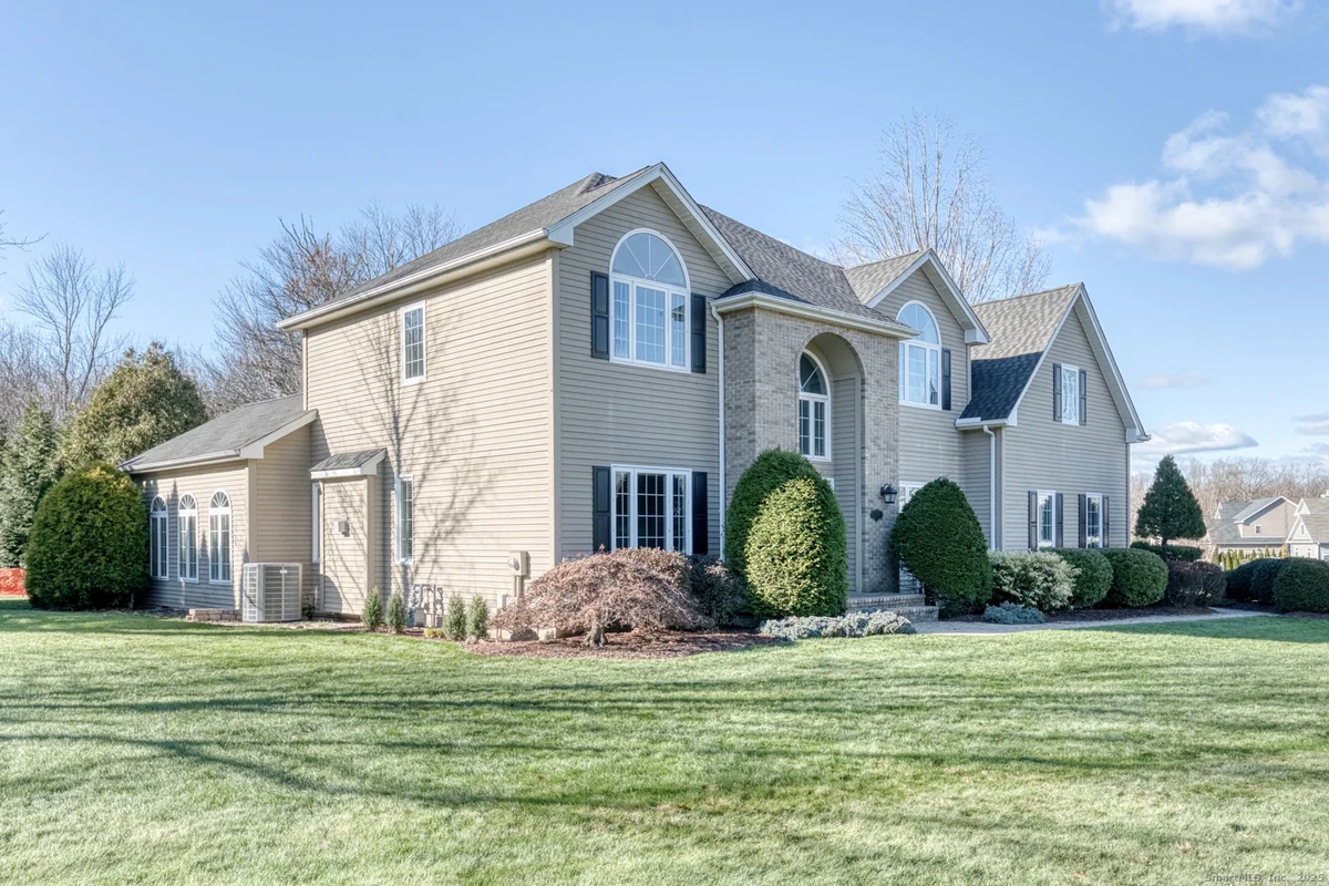Suburban Southington CT home exterior with modern smart home appeal