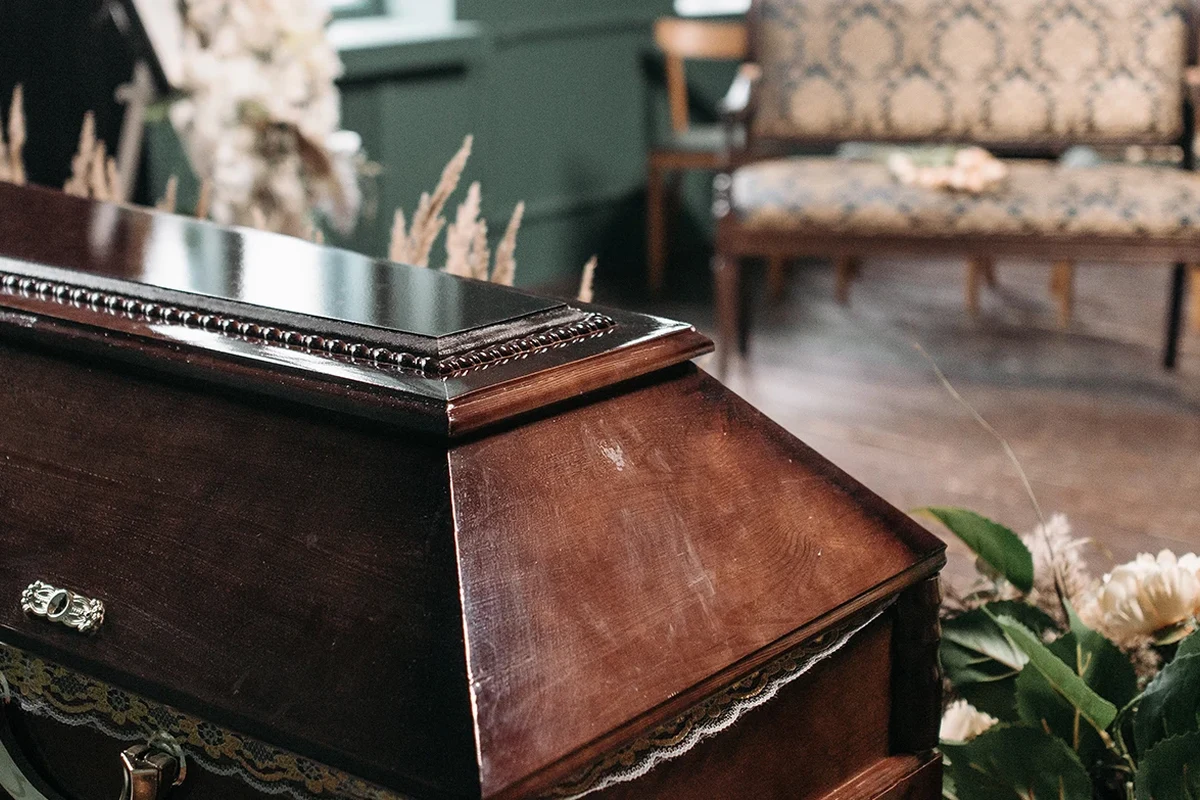 Obituary listing page for Mcpeters Funeral Home with service details and memorial information